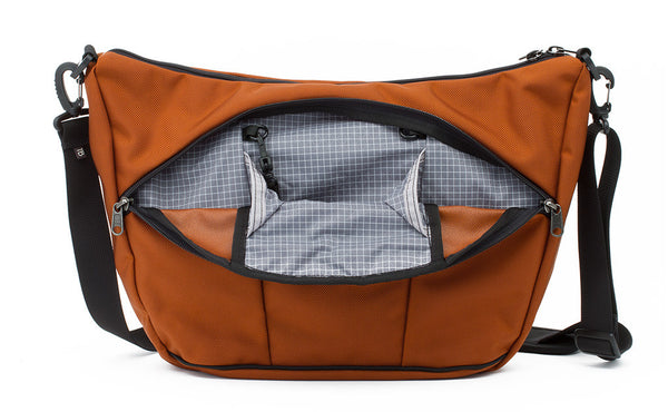 Parental Unit with Burnt Orange 1050 Ballistic with Northwest Sky (light grey with white grid) 200 Halcyon interior.